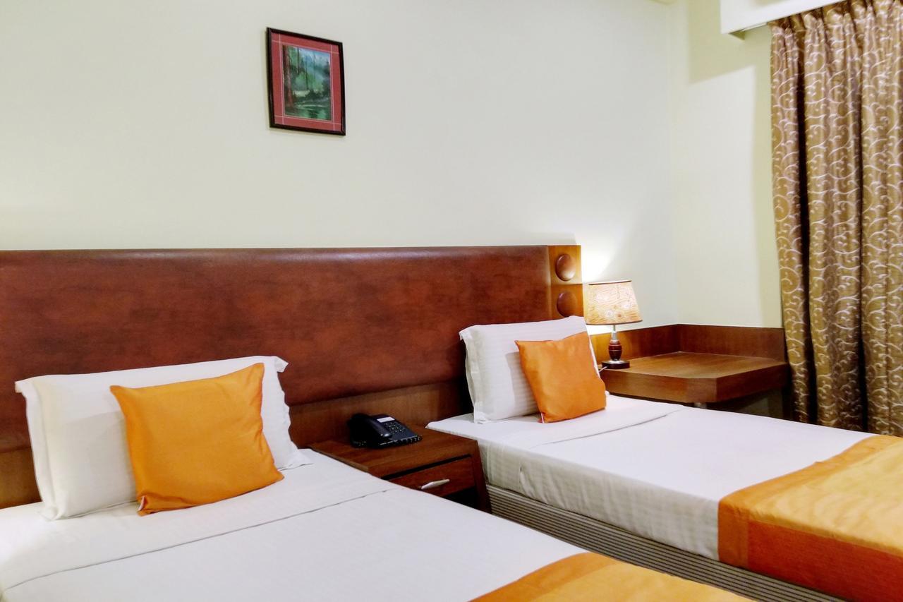 Oyo 6110 Thalassa Suites Bangalore Extérieur photo