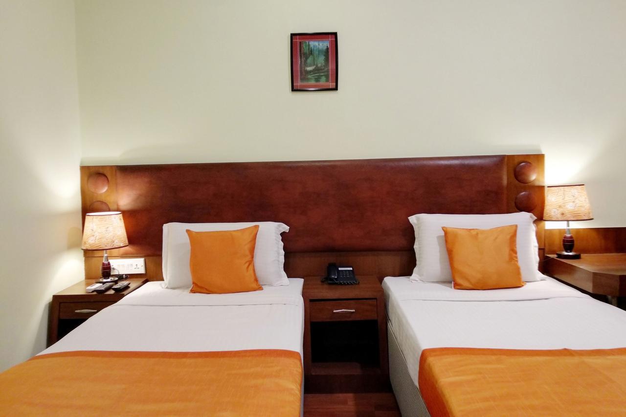 Oyo 6110 Thalassa Suites Bangalore Extérieur photo