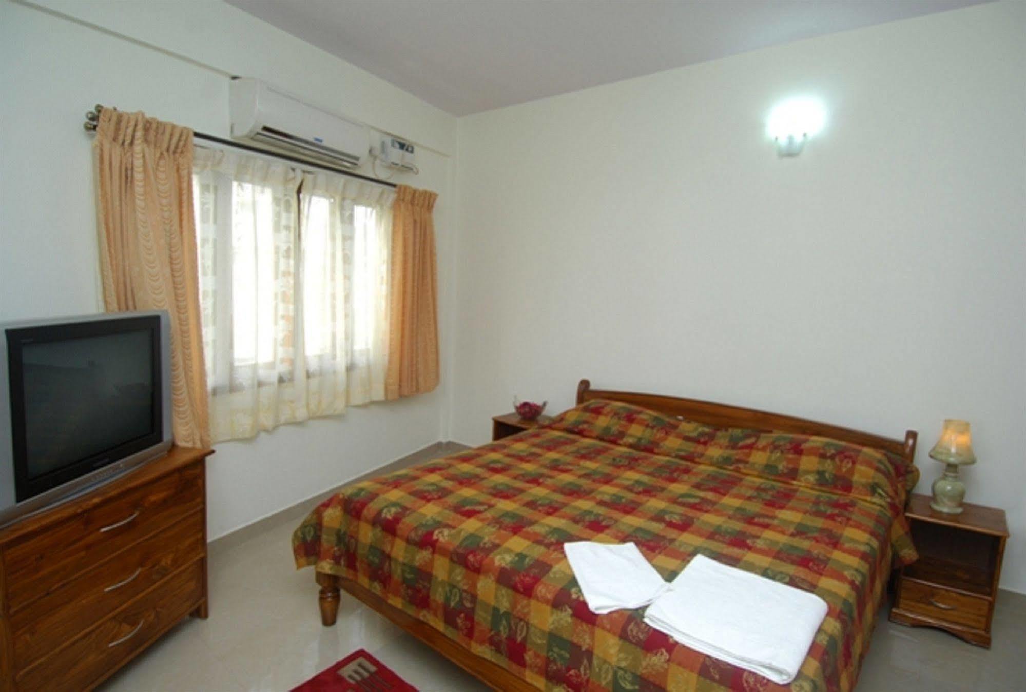 Oyo 6110 Thalassa Suites Bangalore Extérieur photo